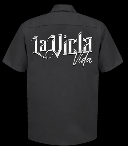 Black Red Kap work shirt back with white La Vicla Vida lettering, Style A